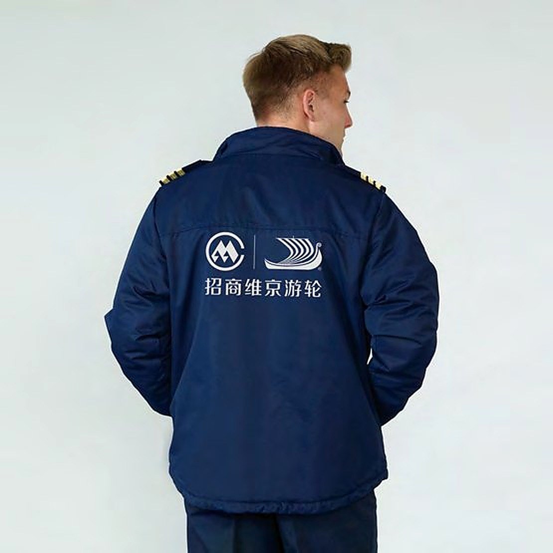 Custom logo application example on a workwear jacket