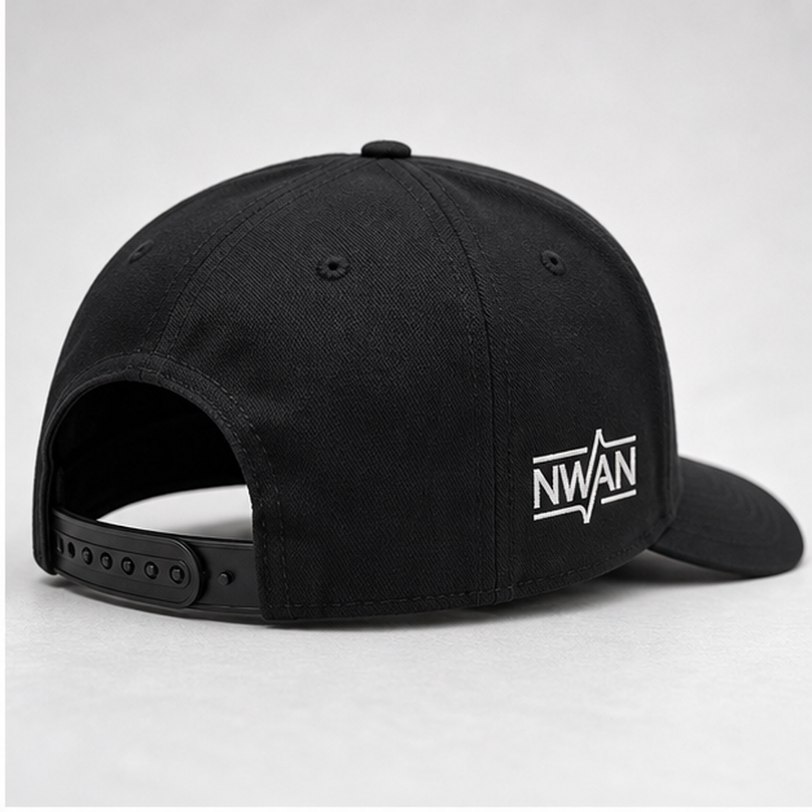Black embroidered corporate cap showing side profile and adjustable closure
