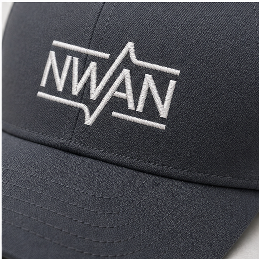 Close up of cap fabric brim stitching and embroidered NWAN logo texture