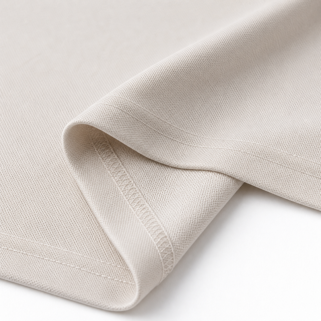 Close-up smooth cool-touch ice-silk polo fabric with fine knit texture