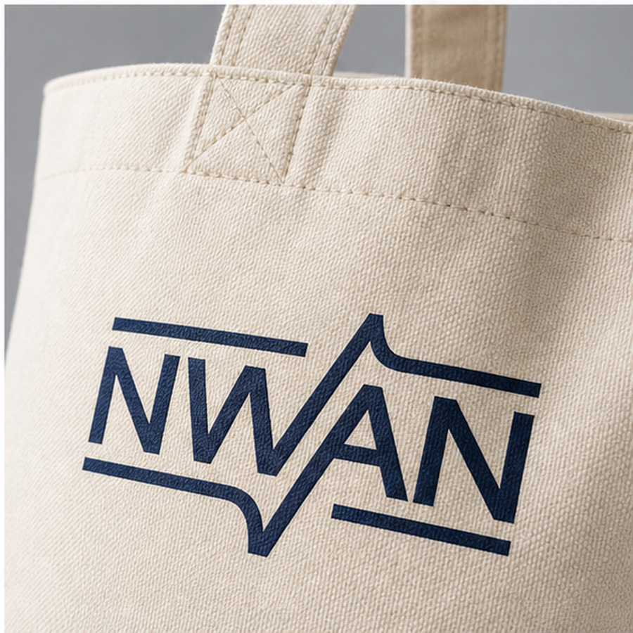 Close up of tote bag canvas texture handle stitching and printed NWAN logo